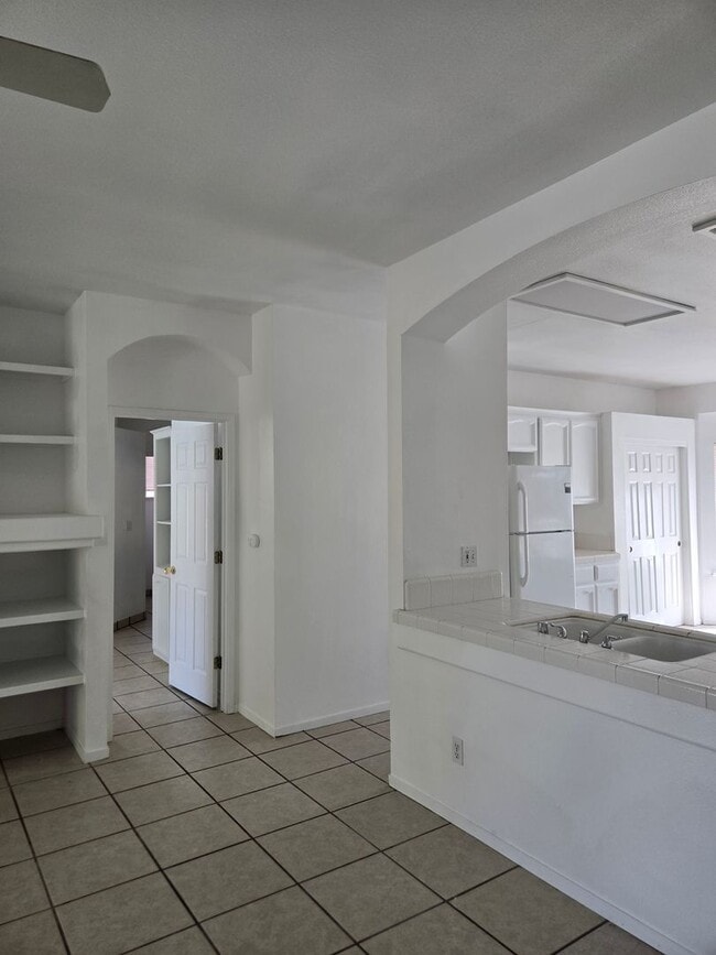 Building Photo - Three bedroom, fresh paint and pool!