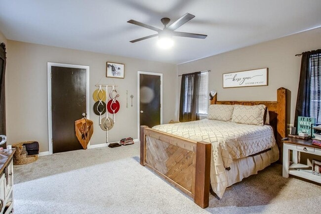 Building Photo - Spacious 4-Bedroom Home with Dual Living Areas