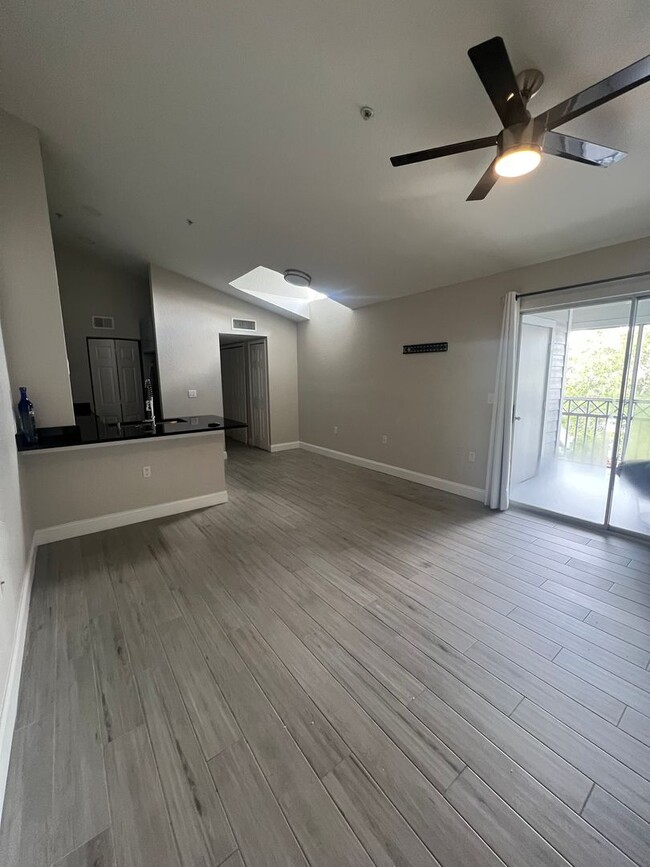 Building Photo - Modern 1-Bedroom Condo with Resort-Style Amenities in Gated Orlando Community