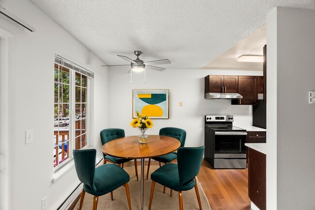 Experience elegant dining in this beautifully designed modern kitchen space. - University Crossing Apartments