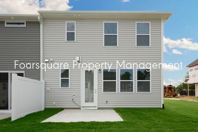 Building Photo - Bright 3-Bed 2.5-Bath End-Unit Townhome with Washer/ Dryer, Granite Kitchen & 2-Car Garage.Conven...