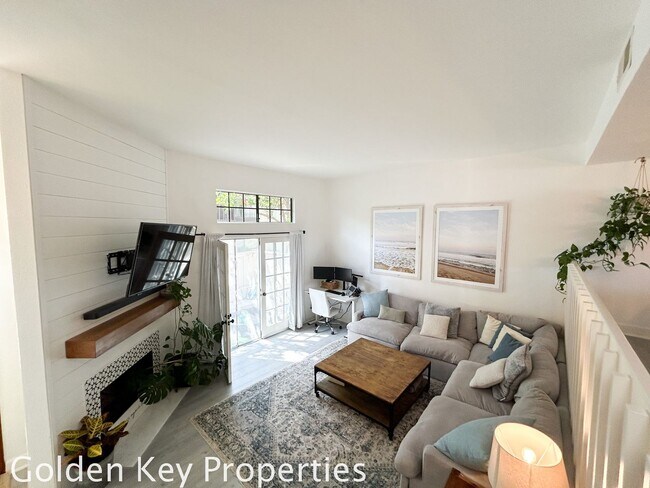 Building Photo - Welcome to this stunning ***unfurnished*** tri-level condo in the desirable Casitas de la Costa c...