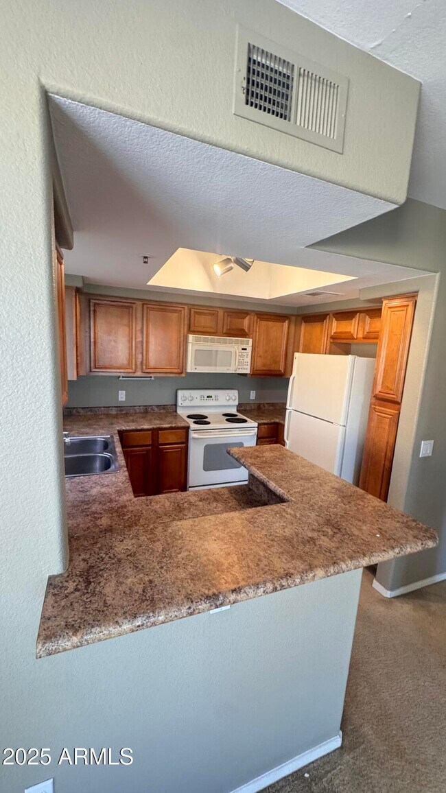 Building Photo - 4925 E Desert Cove Ave