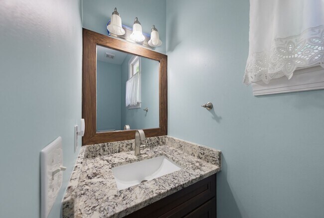 Building Photo - Southern Charm Meets Everyday Entertainment and Convenience!