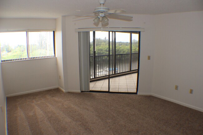 Building Photo - 2/2 Condo with Marina and River Views-Includes cable and water