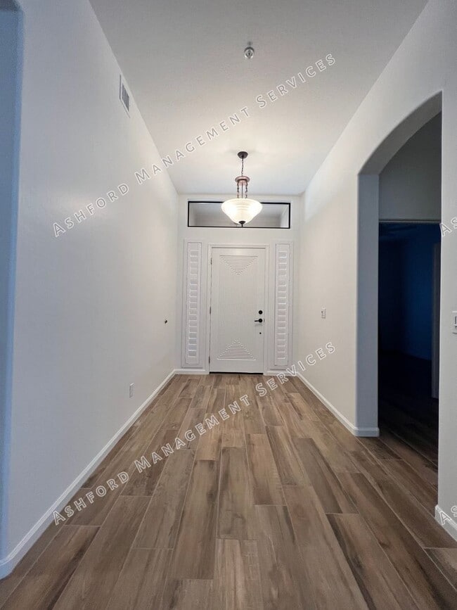 Building Photo - COME HOME TO LUXURY IN GATED GRAYHAWK GOLF...