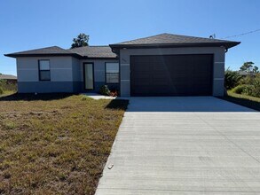 Building Photo - Brand-New 3-Bedroom Home for Rent in Lehigh Acres – Modern Design + Special Offer!