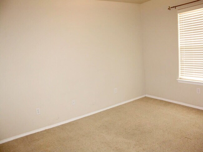 Building Photo - House Located Between 34th & Milwaukee & Minutes From W. Loop 289 Access!