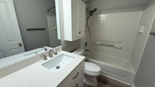 Building Photo - Major Updates! Raised Ranch Style Condo wi...