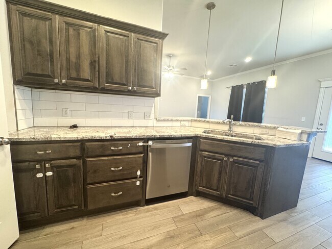 Building Photo - 9009 Yassir Blvd