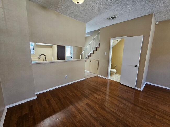 Building Photo - Stunning two-level, two-bedroom, one-and-a-half-bathroom townhome