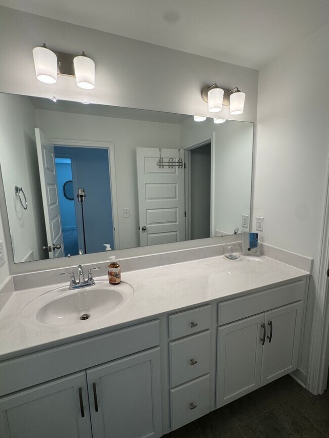 Building Photo - Fully Furnished 4BR Home with Loft, Patio & 2-Car Garage – Lawn Care Included