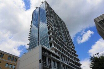 Building Photo - Large 1 Bed Loft with 20 Foot Wall of Glass City View at The VUE!
