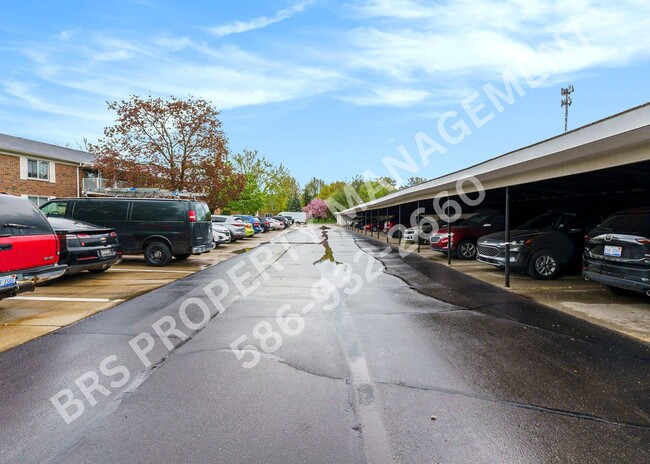 Building Photo - Charming 2-Bedroom Condo in Clinton Twp. –...