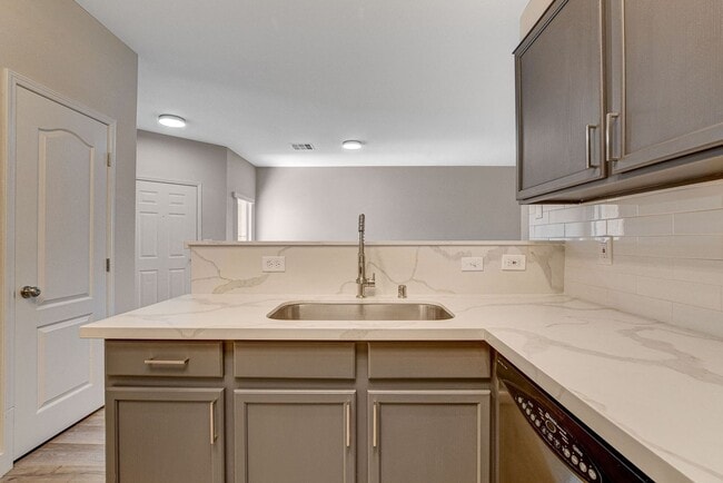 Building Photo - Upgraded First-Floor Condo in a Gated Summ...