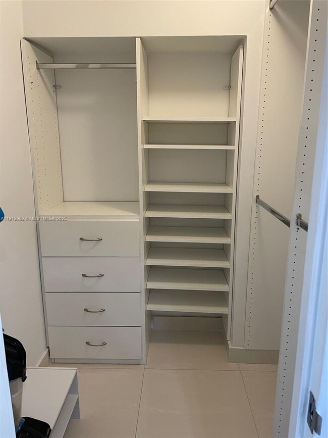 Building Photo - 10275 Collins Ave