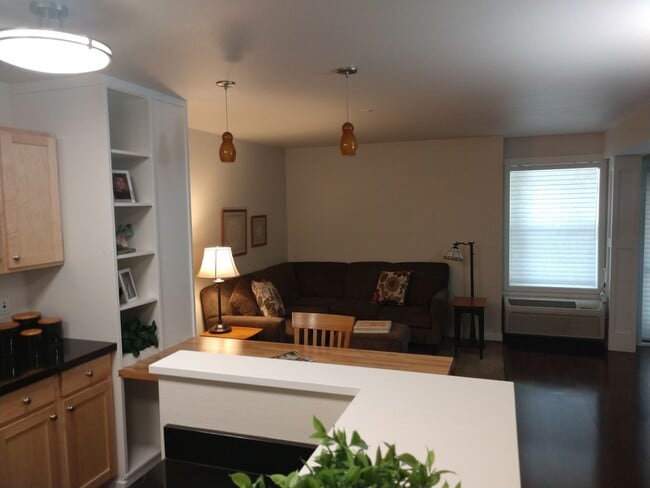 Building Photo - SAVE MONEY ON EXTENDED STAYS.  Beautiful Furnished and Completly Supplied Condo in Downtown Misso...