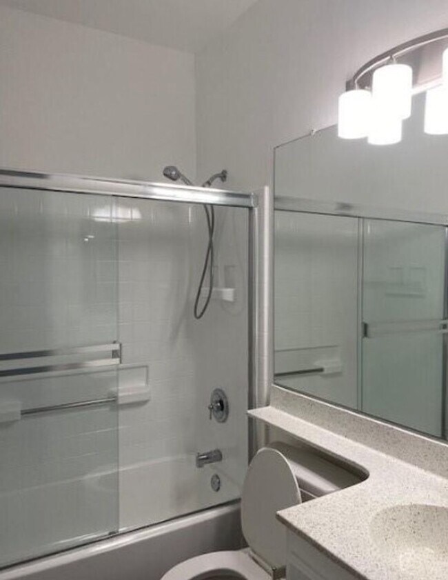 Building Photo - Step into luxury living with this exquisite 2 bedroom 2 bath 3rd floor condo at Emerald Villas