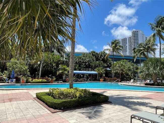 Building Photo - 19390 Collins Ave