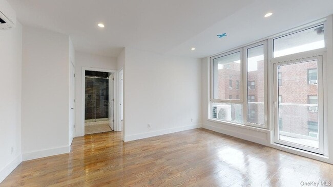 Building Photo - 138-28 Queens Blvd