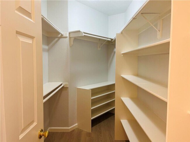 Building Photo - Amazing condominium in gated upscale neigh...