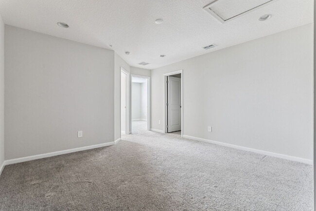 Building Photo - Stunning 3 bedroom, 2.5 bathroom townhome located in a highly desirable gated community