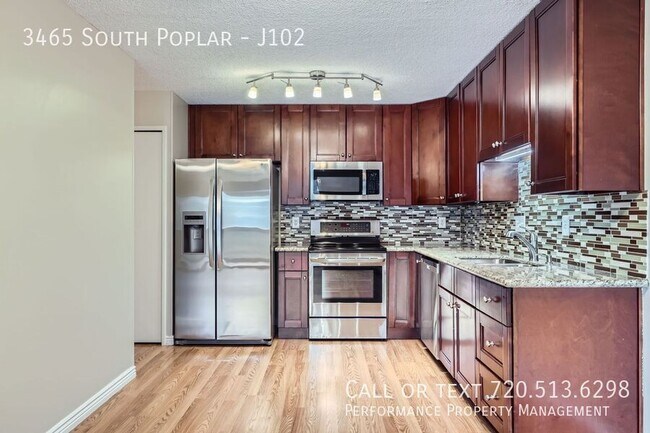 Building Photo - 3465 South Poplar-J102