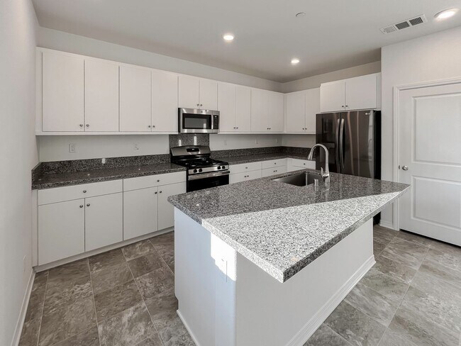 Building Photo - NEWER CONSTRUCTION ~SOLAR~ 3 BED 3 BATH BE...