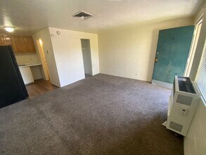 Building Photo - FIRST MONT FREE! - ALL UTILITIES INCLUDED