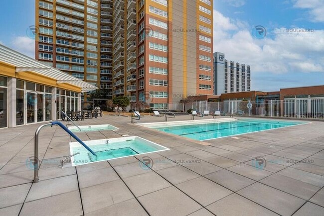 Building Photo - Modern 1 Bedroom 1 Bath Luxury Condo at Th...