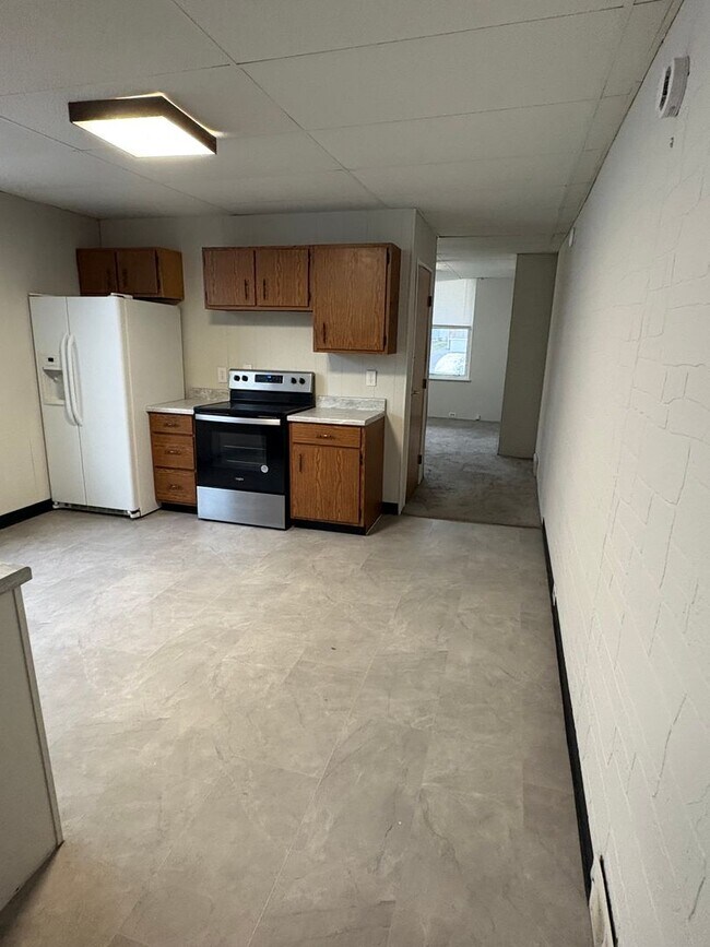 Building Photo - NORWOOD- Cute 2 bedroom 1.5 baths with fenced yard