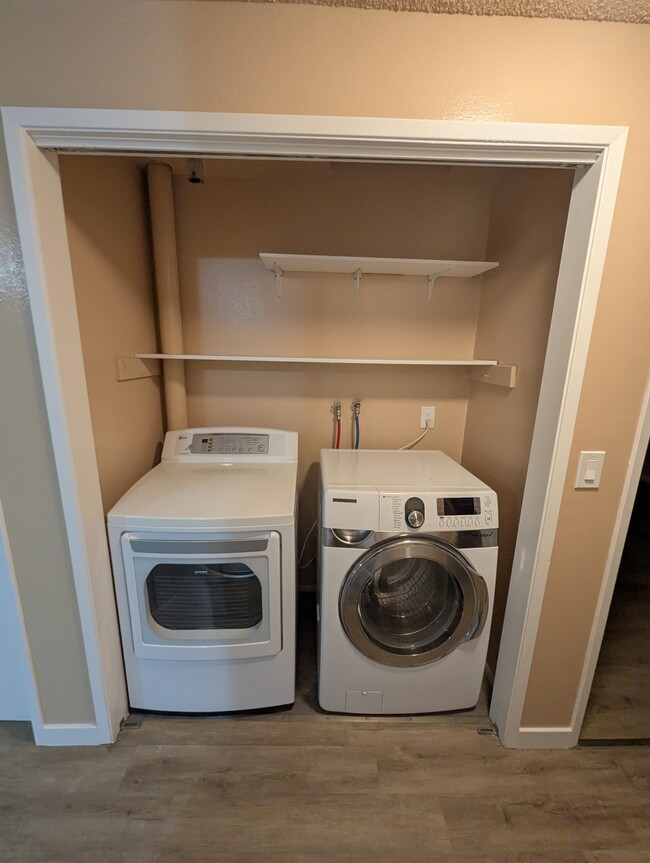 Laundry with shelving - 6115 W Beech St