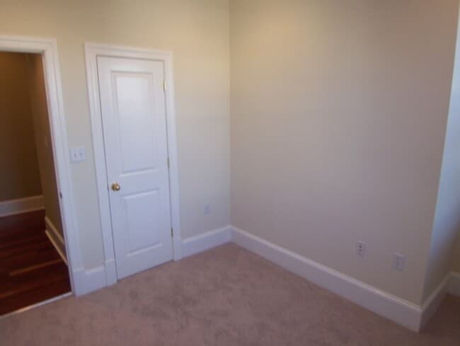 Building Photo - Be Majestic at the Majestic Condominiums! ...