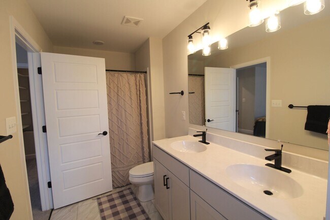 Building Photo - New construction 4 bed 3.5 bath townhome!
