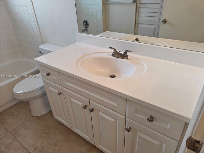 Building Photo - 8770 Royal Palm Blvd