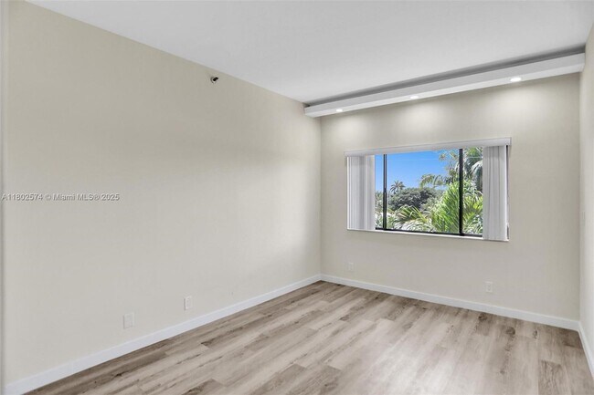 Building Photo - 8816 Collins Ave