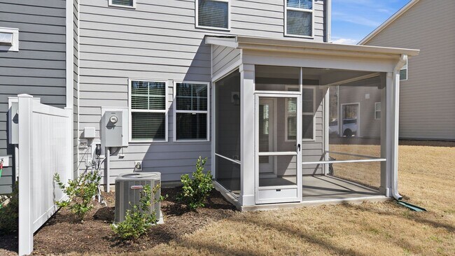 Building Photo - Upgraded 3BR Townhome in Wake Forest | Open Layout, Garage & Resort-Style Amenities