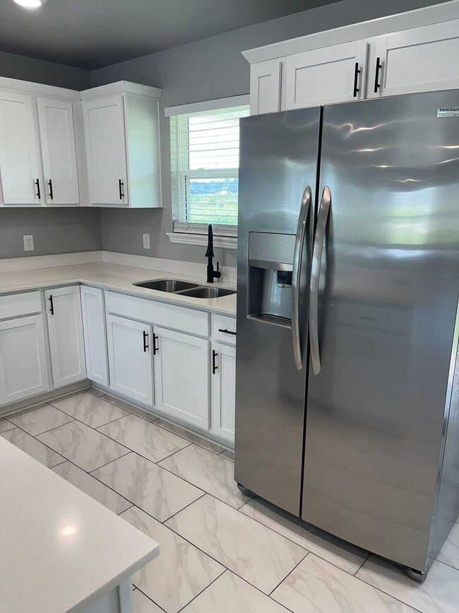 Building Photo - COX-NORTHRIDGE DRIVE TOWNHOMES