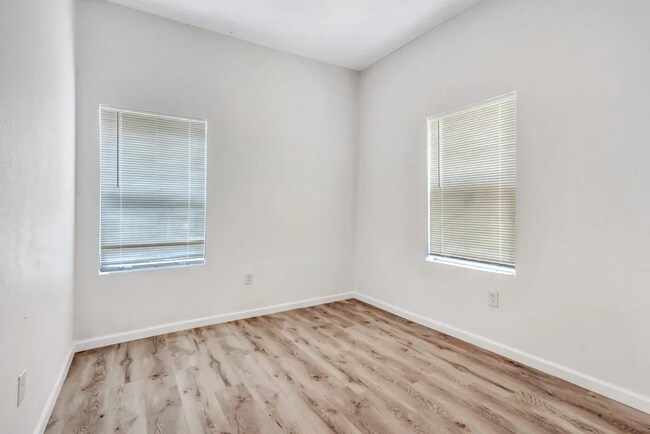 Building Photo - Renovated and full of character, this 3-be...