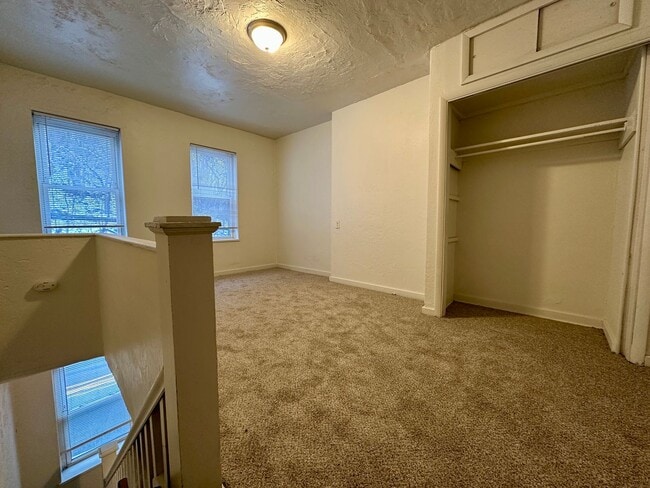 Building Photo - Super Spacious Three Bedroom on Bates Street! Deck & Patio! Washer & Dryer Included! Call Today!