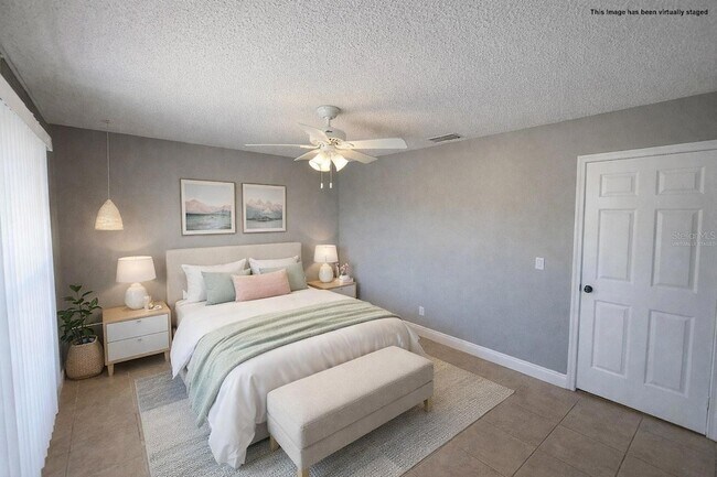 Building Photo - 6525 Manila Palm Way