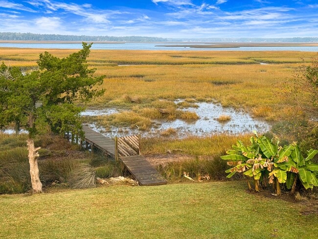 Building Photo - Spacious 4 Bedroom, 2.5 Bath Home with Stunning Marsh Views