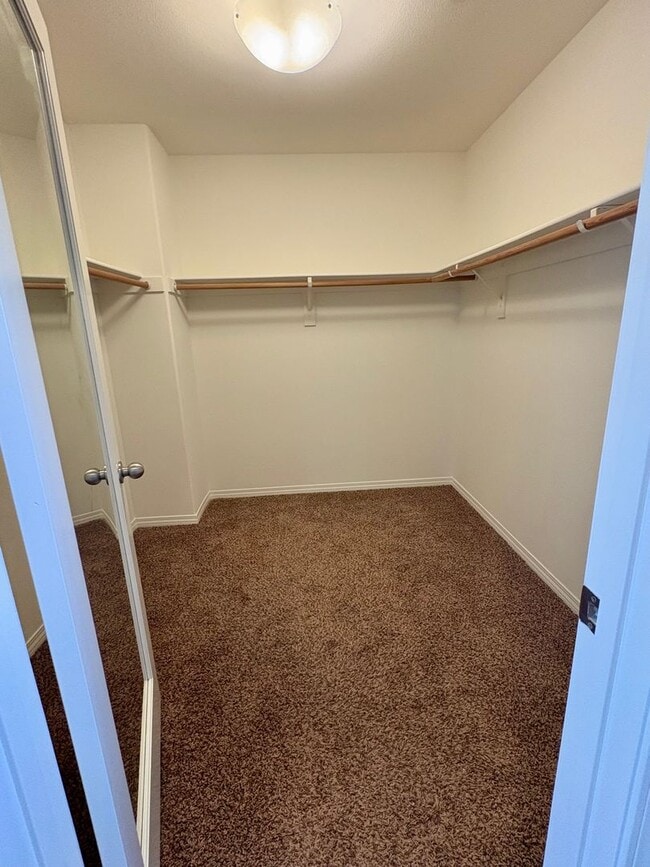 Building Photo - Tri-Level Condo within Walking Distance to...