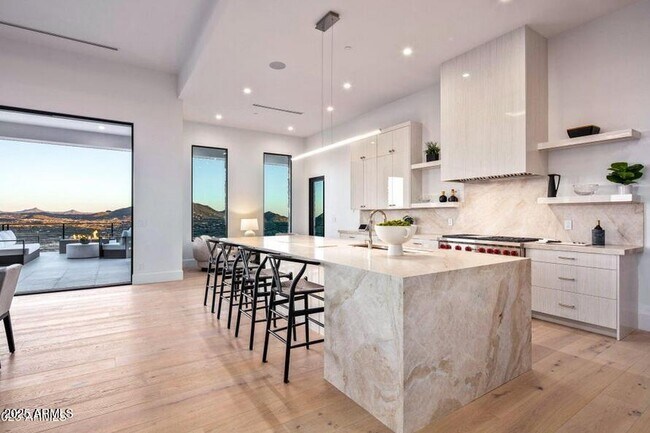 Building Photo - 4880 E Lone Mountain Rd N