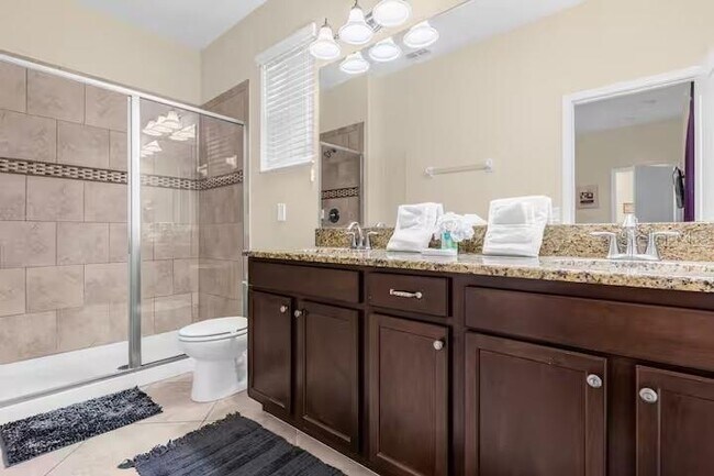 Building Photo - 8802 Bamboo Palm Ct