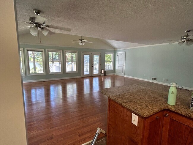 Building Photo - Lakefront Living with Style and Space