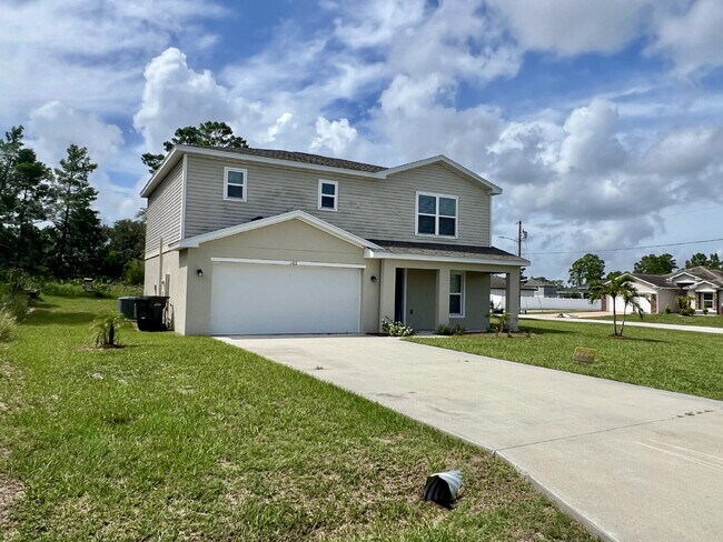 Building Photo - Spacious 4-Bedroom Home with Primary Suite...