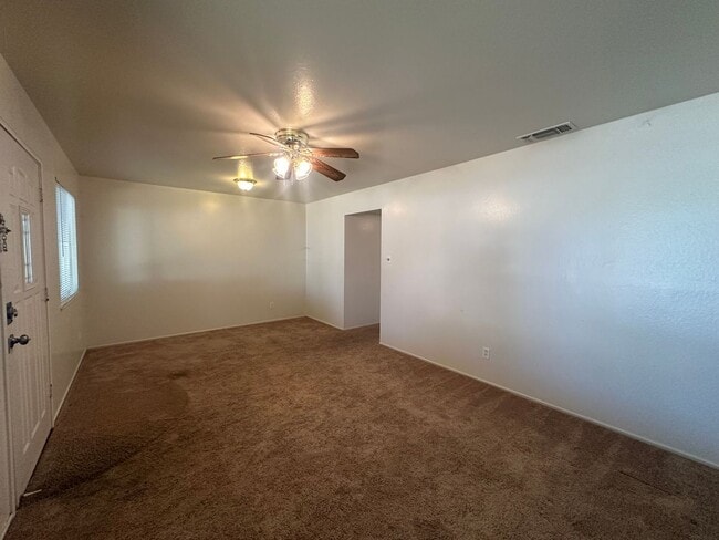 Building Photo - Three Bedroom Two Bathroom Home with Yard