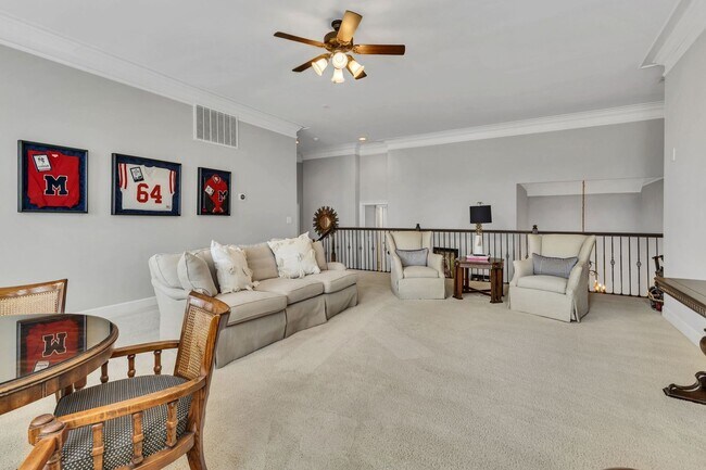 Building Photo - Fully Furnished 4 Bedroom, 3.5 Bath w/ 3 Car Garage and Unfinished Basement in Governors Club
