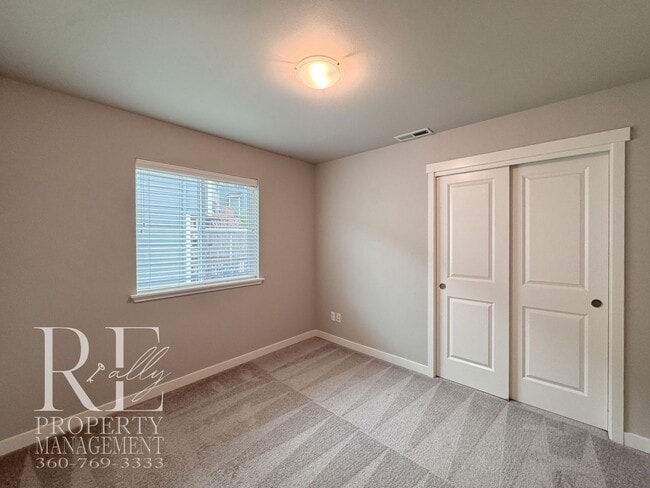 Building Photo - Vaulted Ceilings, Tree-Lined Views & a Spacious Primary Suite Retreat